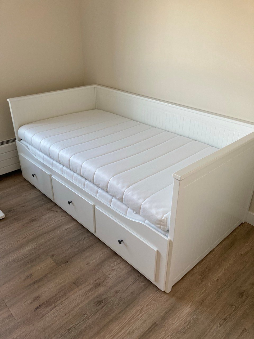 White IKEA HEMNES daybed with storage drawers assembled